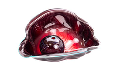 Dale Chihuly's Oxblood Seaform with Turquoise Lip Wrap is a masterful expression of organic form and dynamic color, epitomizing the artist's unparalleled innovation in the medium of glass.