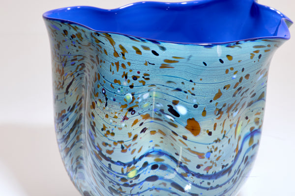 Dale Chihuly / Blue Opal Macchia (1982), a signed and dated hand-blown glass sculpture measuring 4.75 inches high by 5.5 inches in diameter