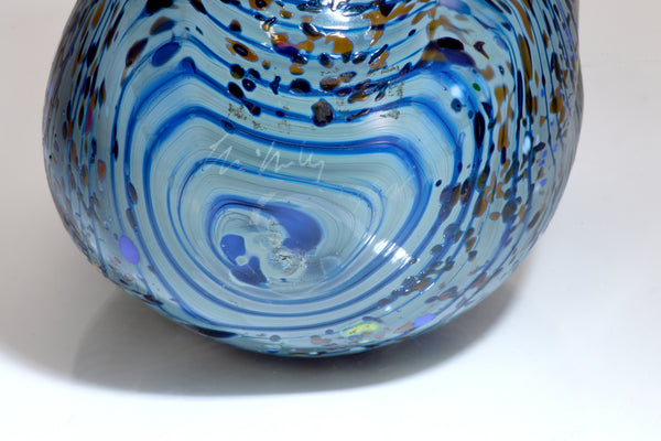 Dale Chihuly / Blue Opal Macchia (1982), a signed and dated hand-blown glass sculpture measuring 4.75 inches high by 5.5 inches in diameter