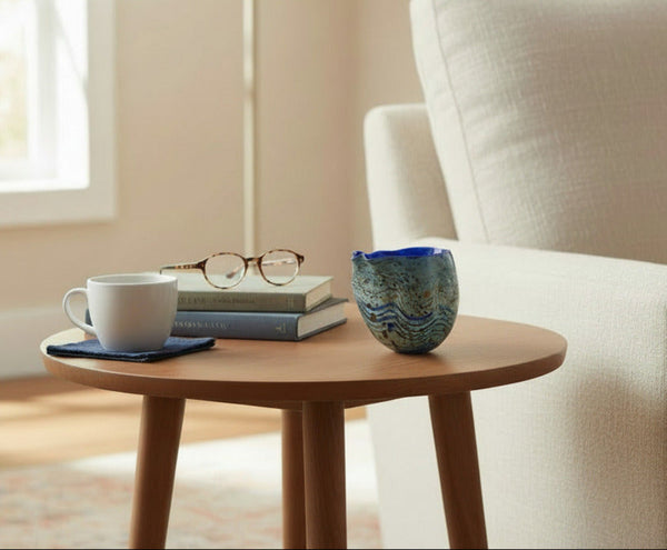 Dale Chihuly / Blue Opal Macchia (1982), a signed and dated hand-blown glass sculpture measuring 4.75 inches high by 5.5 inches in diameter