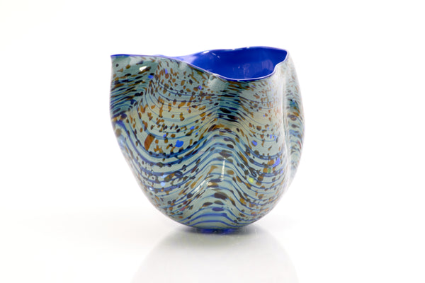 Dale Chihuly / Blue Opal Macchia (1982), a signed and dated hand-blown glass sculpture measuring 4.75 inches high by 5.5 inches in diameter