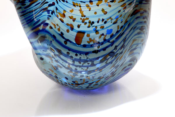 Dale Chihuly / Blue Opal Macchia (1982), a signed and dated hand-blown glass sculpture measuring 4.75 inches high by 5.5 inches in diameter