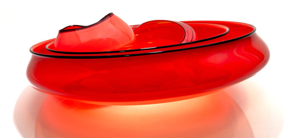 Dale Chihuly, Four-Piece Castillian Red Basket Set with Black Lip Wraps, a hand-blown glass ensemble with fluid, asymmetrical forms and rich red color accented by bold black lip wraps