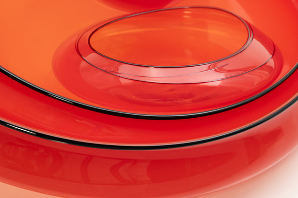 Dale Chihuly, Four-Piece Castillian Red Basket Set with Black Lip Wraps, a hand-blown glass ensemble with fluid, asymmetrical forms and rich red color accented by bold black lip wraps