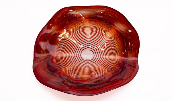 Dale Chihuly, Four Piece Red Seaform Set with Turquoise Lip Wrap, (1987) is a hand-blown glass sculpture featuring four organic red forms accented with a vibrant turquoise lip wrap