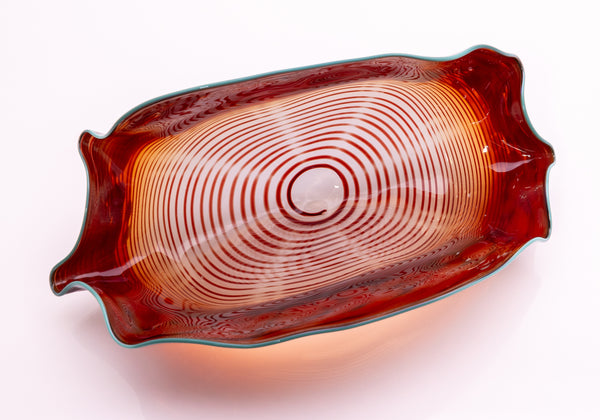 Dale Chihuly, Four Piece Red Seaform Set with Turquoise Lip Wrap, (1987) is a hand-blown glass sculpture featuring four organic red forms accented with a vibrant turquoise lip wrap
