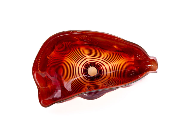 Dale Chihuly, Four Piece Red Seaform Set with Turquoise Lip Wrap, (1987) is a hand-blown glass sculpture featuring four organic red forms accented with a vibrant turquoise lip wrap