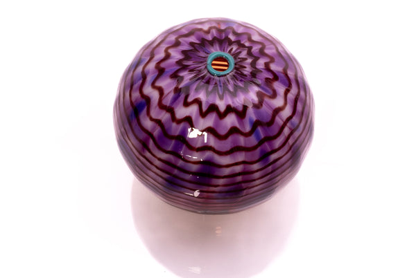 Dale Chihuly, Four Piece Red Seaform Set with Turquoise Lip Wrap, (1987) is a hand-blown glass sculpture featuring four organic red forms accented with a vibrant turquoise lip wrap