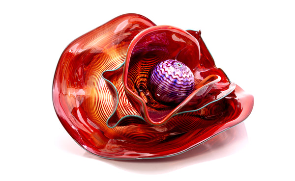 Dale Chihuly, Four Piece Red Seaform Set with Turquoise Lip Wrap, (1987) is a hand-blown glass sculpture featuring four organic red forms accented with a vibrant turquoise lip wrap