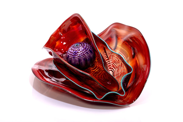 Dale Chihuly, Four Piece Red Seaform Set with Turquoise Lip Wrap, (1987) is a hand-blown glass sculpture featuring four organic red forms accented with a vibrant turquoise lip wrap