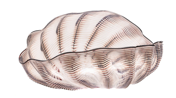 Dale Chihuly's "Ivory Red Seaform with Black Lip Wrap" (1983), is a stunning hand-blown glass sculpture.