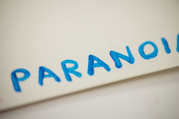 David Shrigley, Fight Your Paranoia, is a 30 x 22.25 inch original acrylic painting on Fabriano paper featuring a clenched fist and ironic text