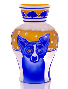 George Rodrigue's "Blue Dog Vase" is an 11-inch glass sculpture translating his iconic Blue Dog motif into a sculptural form
