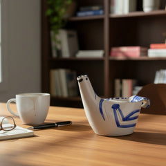 Pablo Picasso's "Sujet Colombre (A.R. 435)" is a Madoura ceramic in white earthenware with engraved enamel decoration.